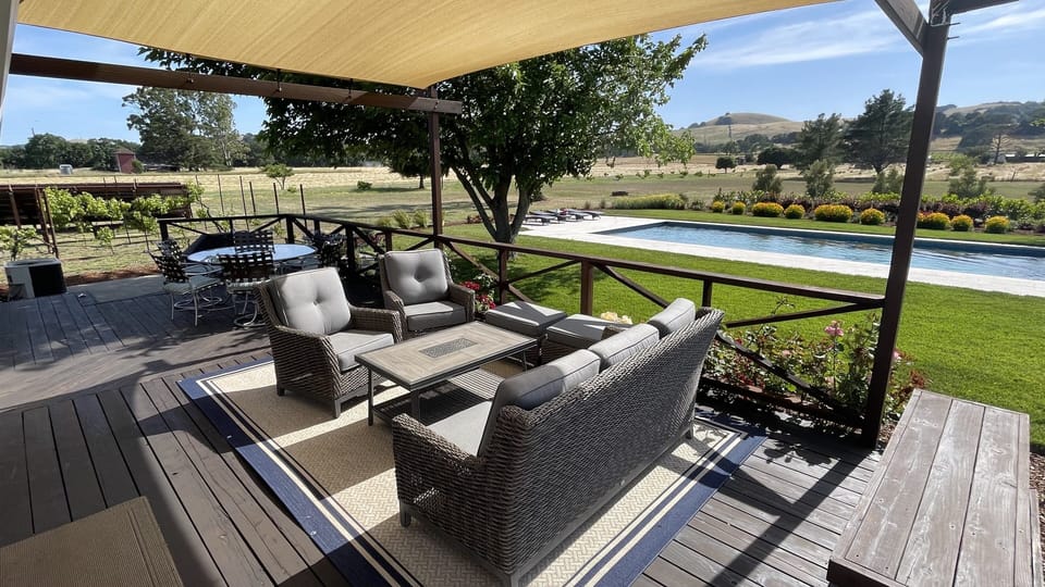 Enjoy wine/cheese and meals comfortably on the large deck