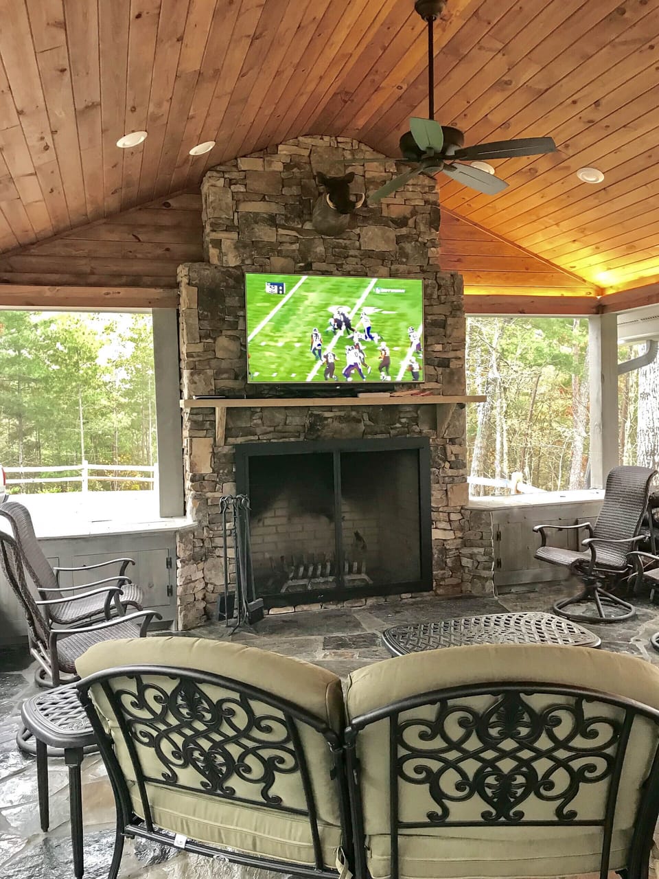 Watch your favorite sports team on the flat screen TV in front of the fireplace