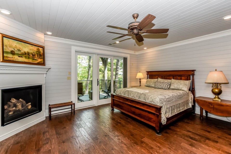 Master Bedroom is on the main level and has a gas fireplace and private deck