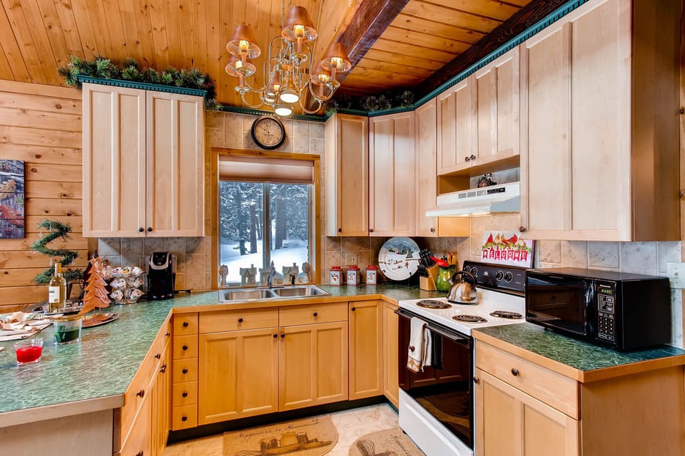 The kitchen has everything you will need. It has even been completely remodeled since this photo was taken with a new stove.