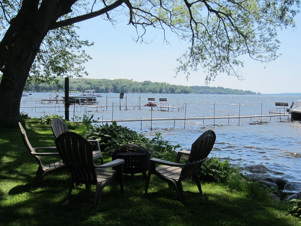 View of Lake, Dock, and Fire Pit from Yard