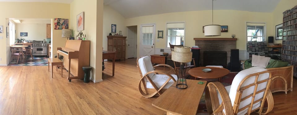 great room showing kitchen on the left and living room on the right
