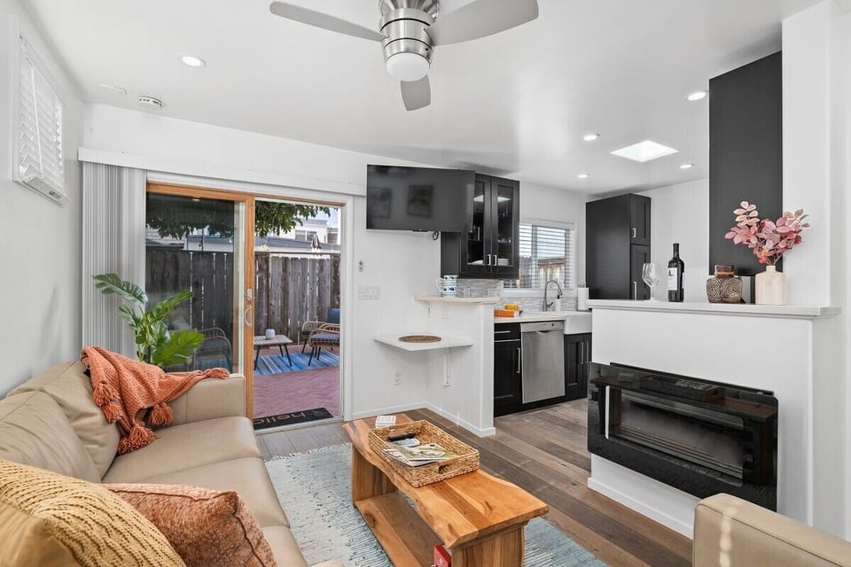 Living room overlooking the private patio.  Fireplace is not functional.