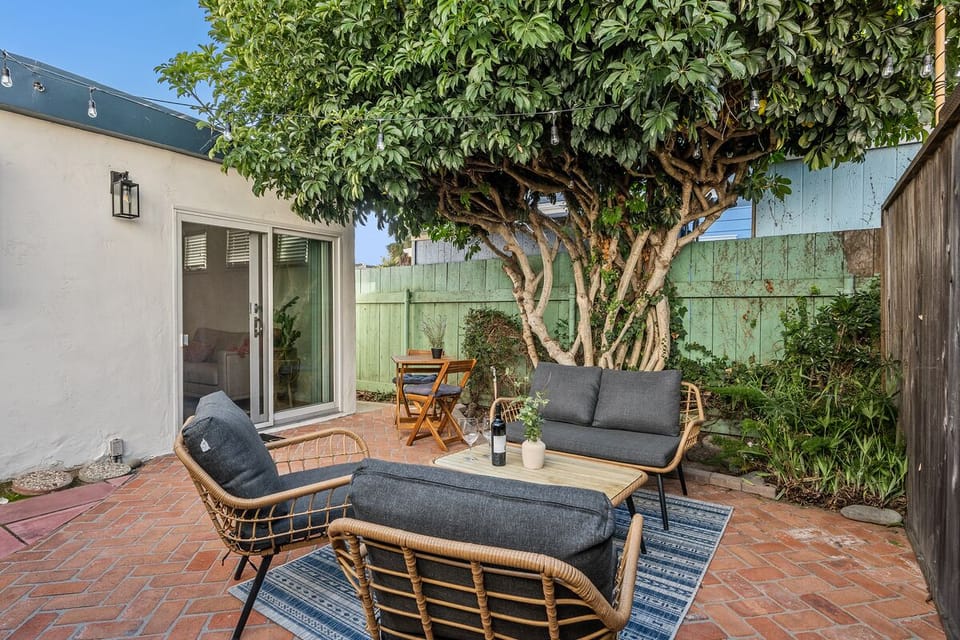 Outdoor sitting area both for relaxing and dining.  
