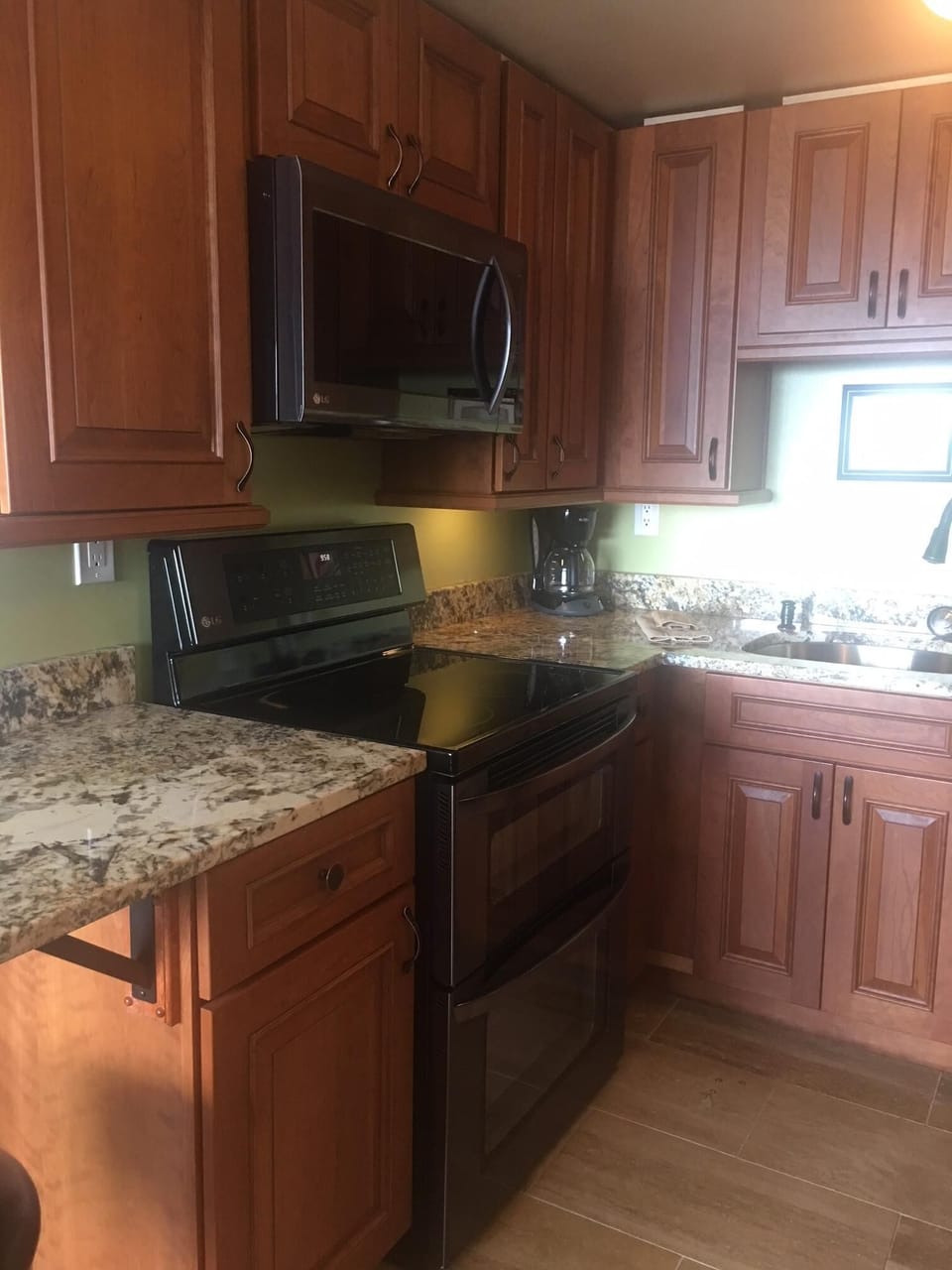 New cabinets, appliances and granite in kitchen