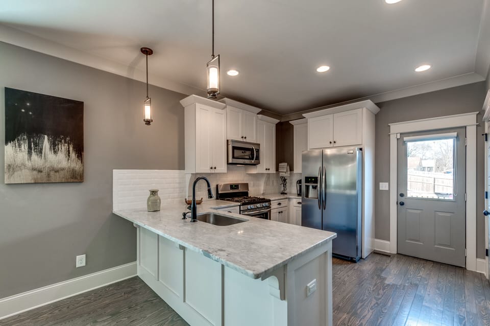 Marble countertops; SS appliances