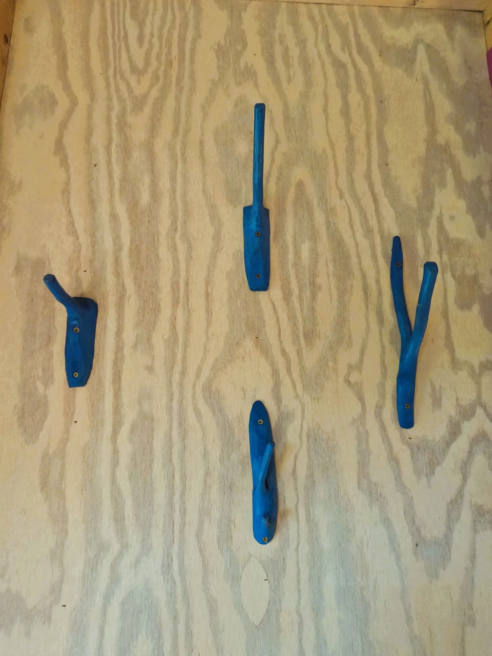 Unique touches throughout. Hooks hand-crafted from branches