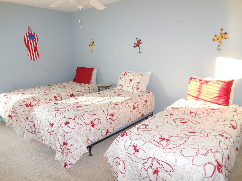 3 twin beds with private bathroom and balcony
