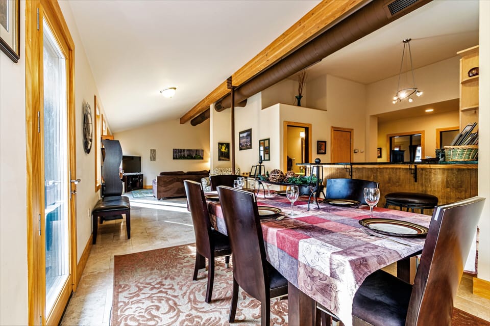 Dining area opens to kitchen so all can gather even if you're cooking!