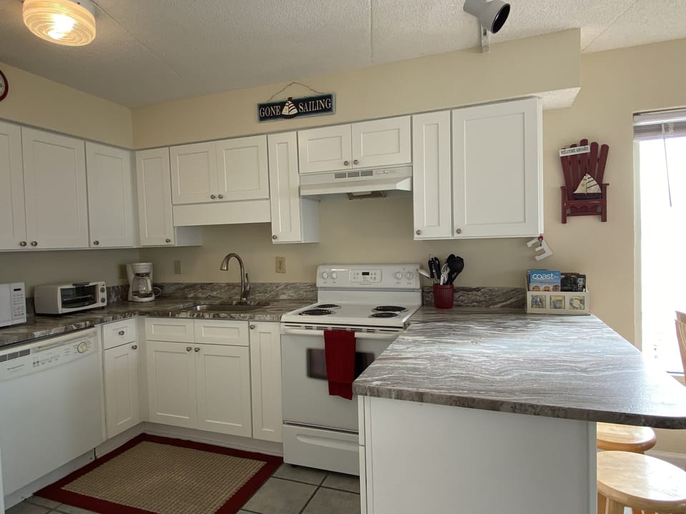 Love the new white cabinets...