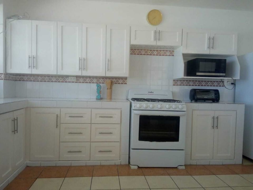 Large Kitchen fully equipped with most appliances, including a gas stove
