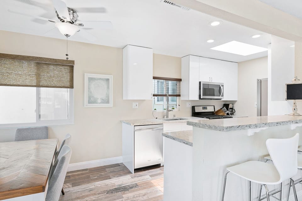 The kitchen opens out to the main living area, making meal prep a social affair!
                