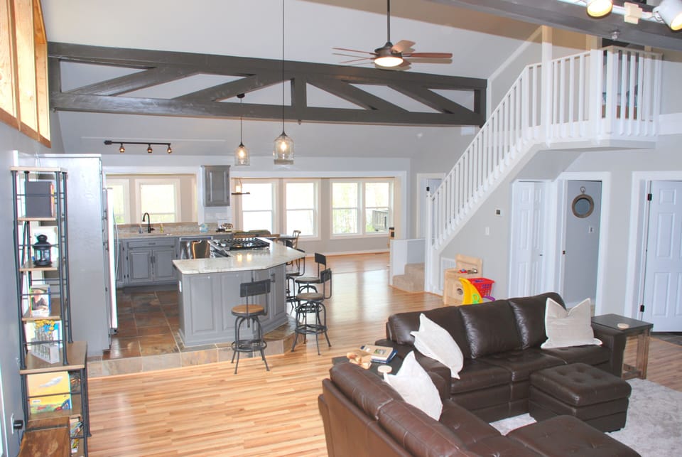 Living looking into kitchen and sunroom