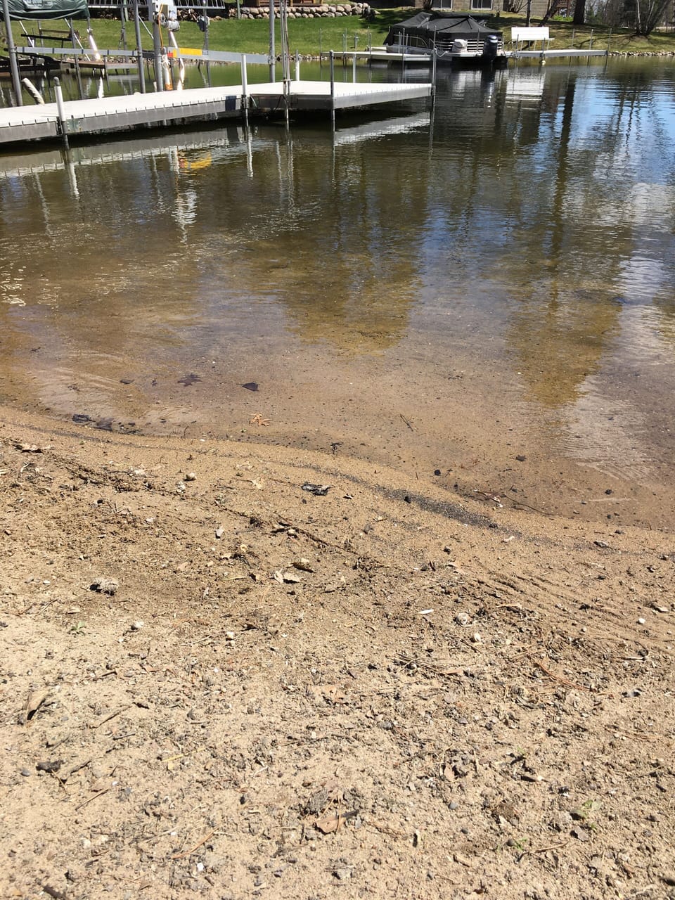 Sandy beach and dock area