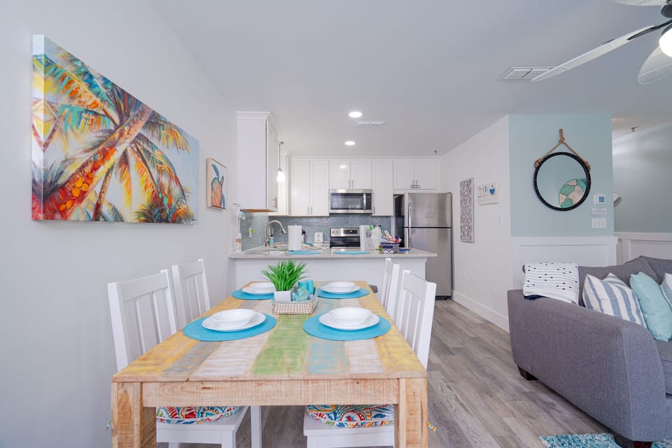 Brand new dining table, seating for 4, and 2 seats at kitchen island