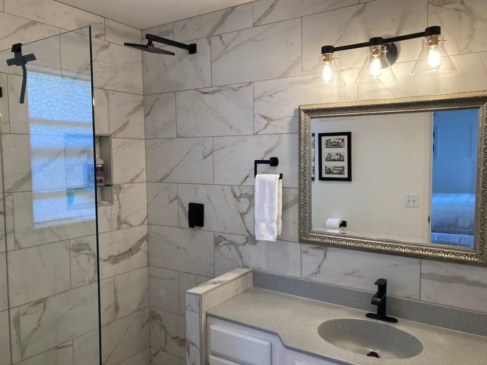Recently renovated & tiled bathroom