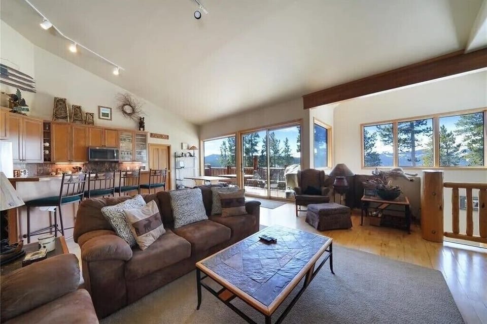 Another view of living area in great room with view gas log fireplace