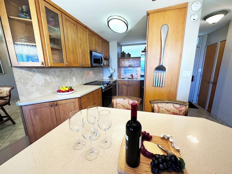 Enjoy cooking your favorite meal in your fully stocked kitchen with stainless steel appliances and granite counter!