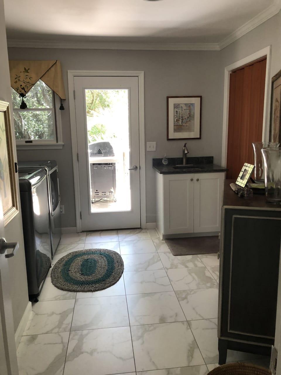 Laundry Room with a Dumb Waiter to the garage