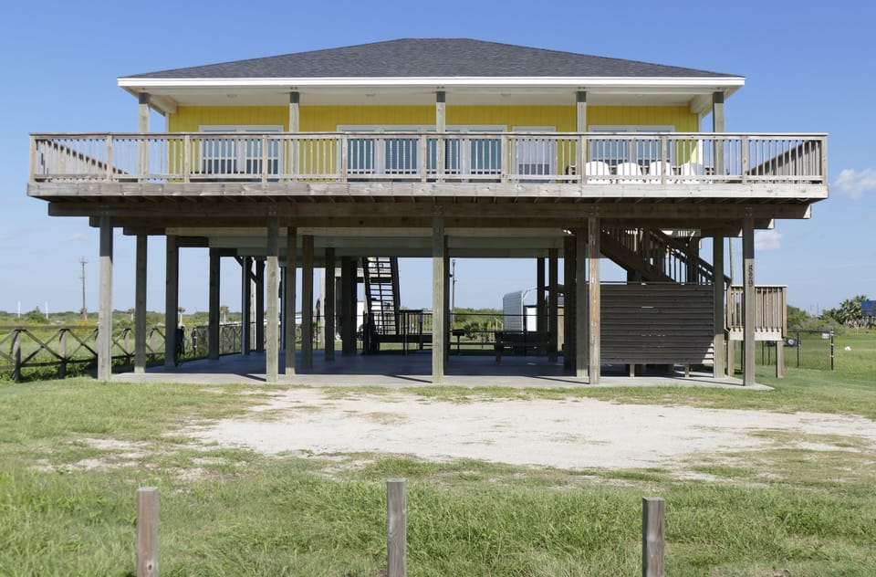 Welcome to Barney's Beach House with a deck that completely surrounds the house