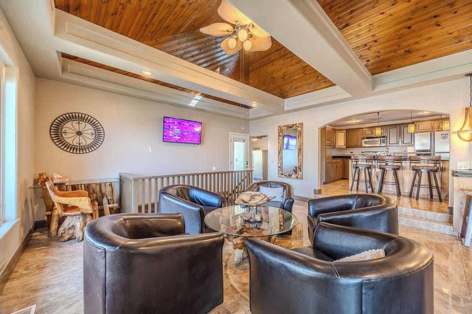 Stylish open-concept living with wood accents, perfect for relaxing.