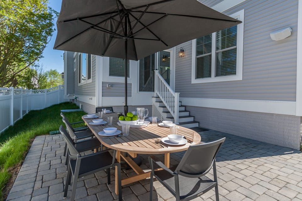 Rear Patio with Seaating and Gas Grill