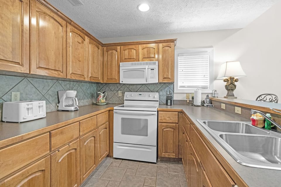 Kitchen--- Spacious with Plenty of Cabinet Space