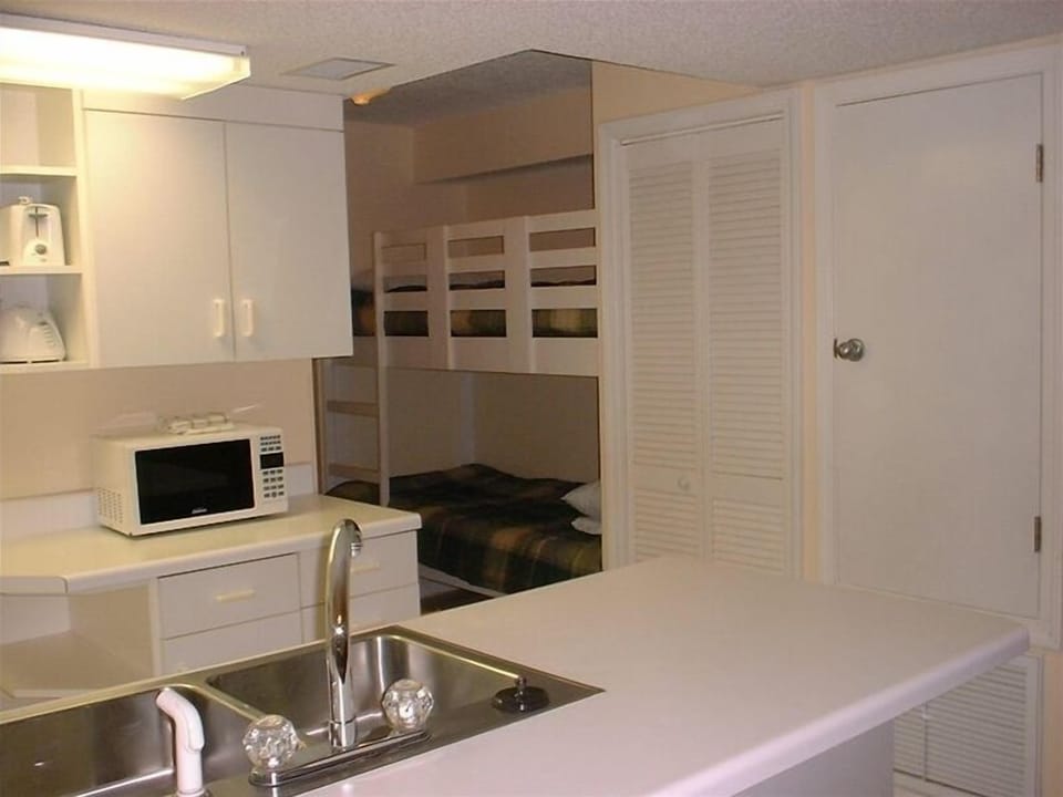 Hall bunks, off the kitchen.