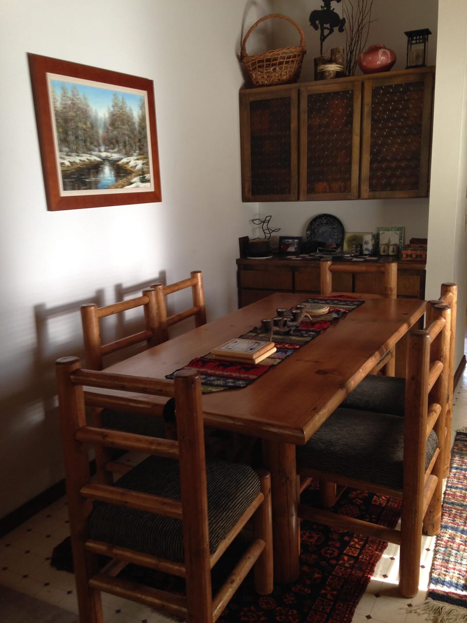Enjoy meals in log cabin furniture dining area.