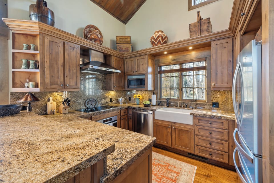 Open air kitchen with all new appliances & perfectly stocked