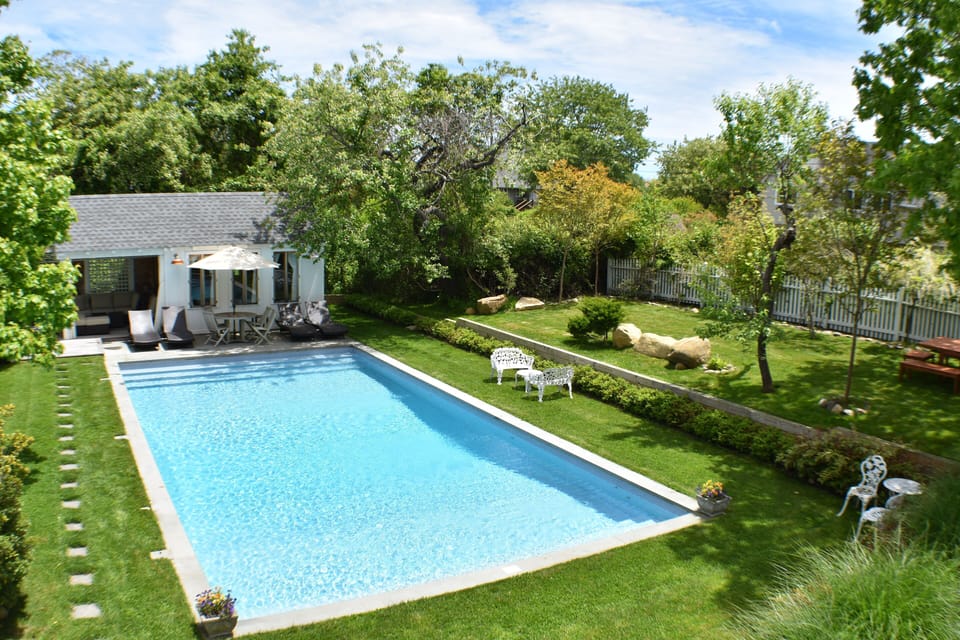 Pool house with gazebo and spa and expansive, private grounds surround pool