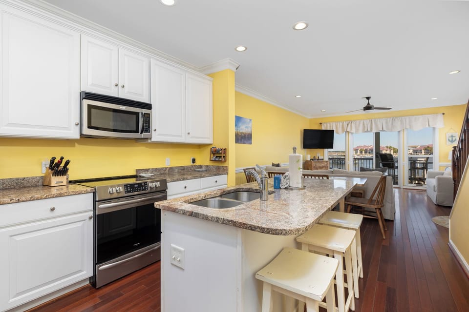 Enter Sail Away and you'll find your fully-equipped kitchen with bartop seating