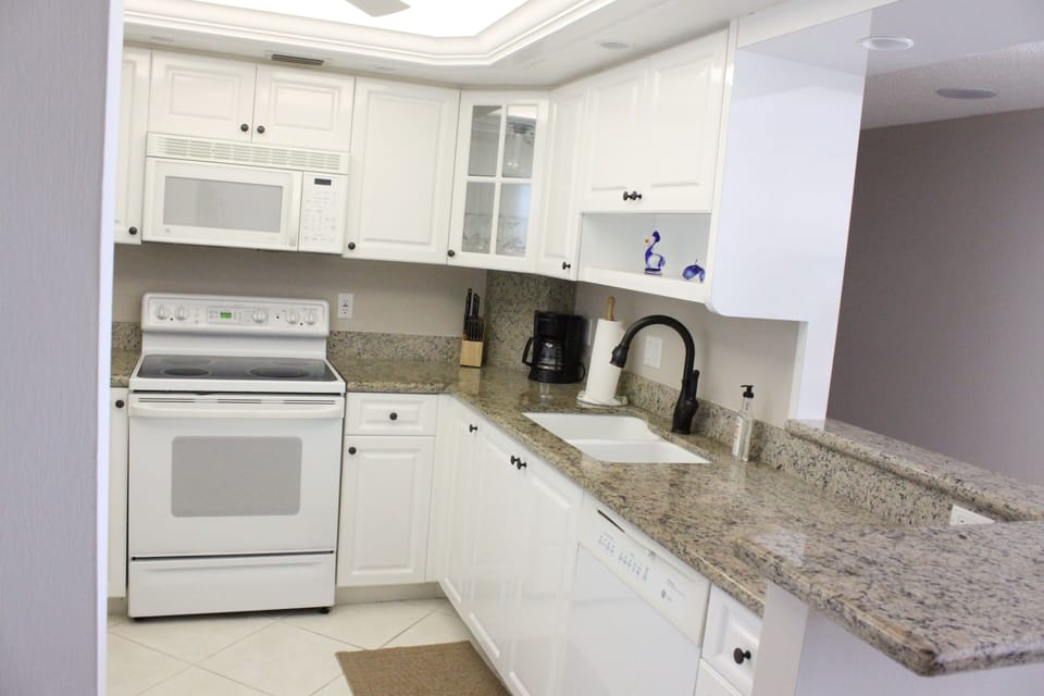 Bright, clean and comfortable.  Kitchen has same beautiful view of beach & gulf!