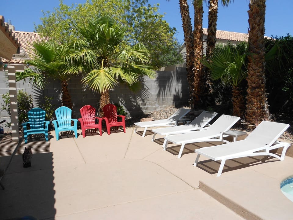 Plenty of Loungers and chairs to enjoy the pool