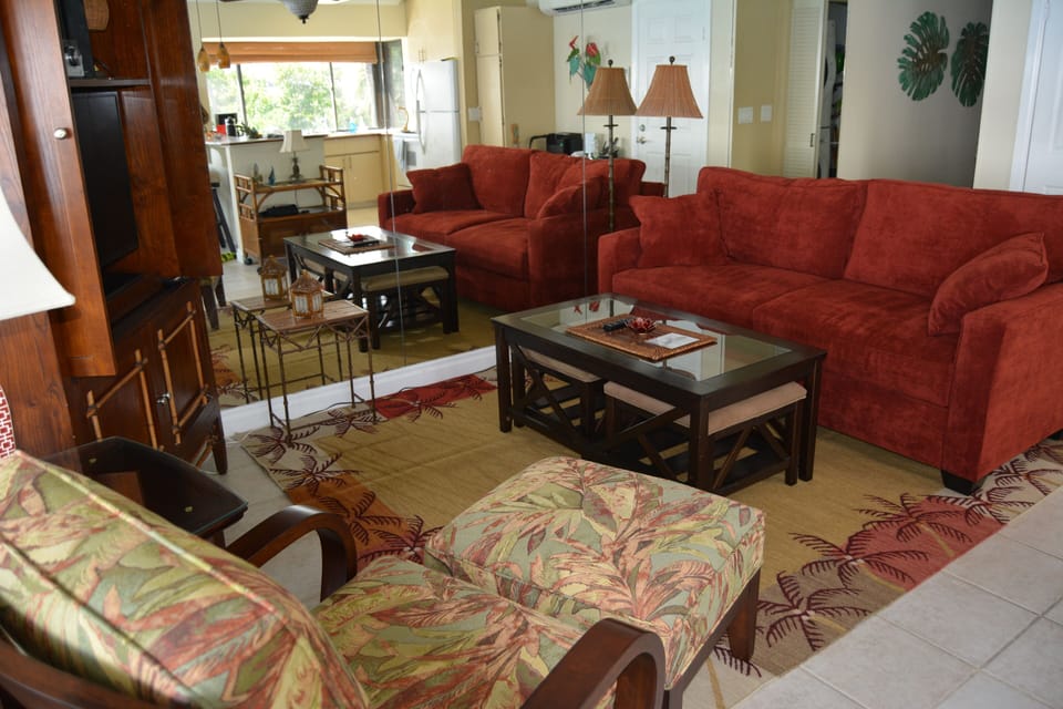 Two pull out ottoman under coffee table