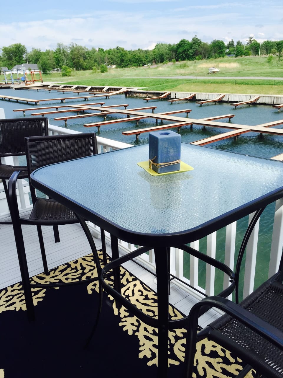 Sitting Area on Balcony with 3-Burner Propane Grill