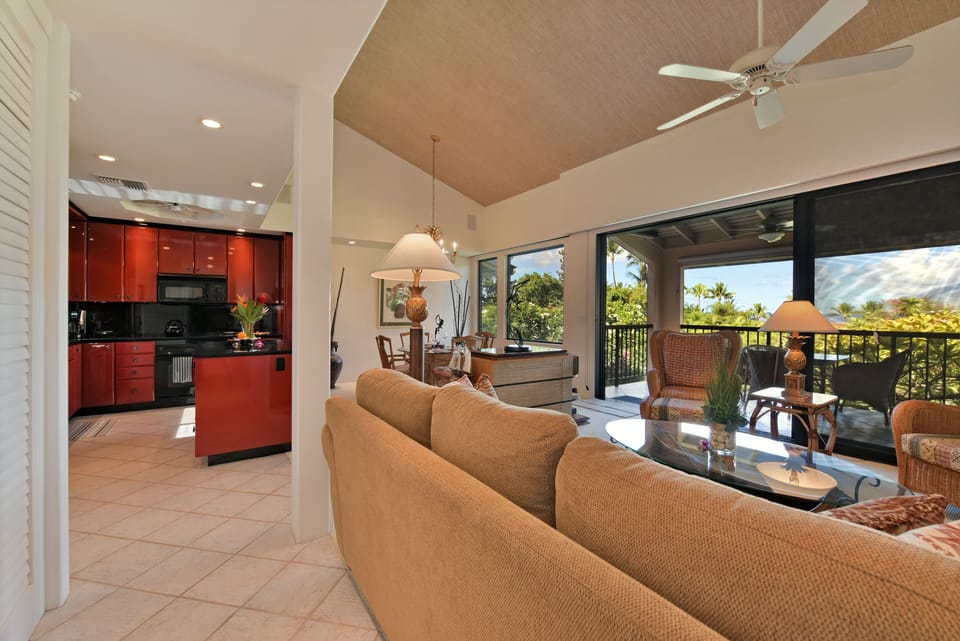 Living area with high vaulted ceilings