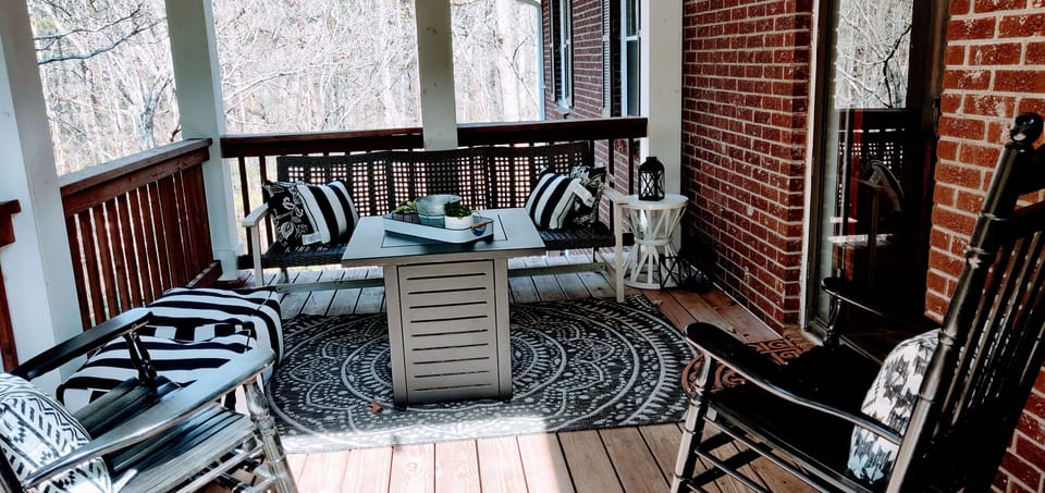 cozy front veranda with rocking chairs