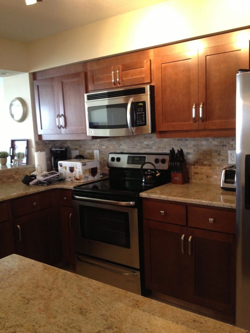 Kitchen with custom cabinets, granite counter tops, stainless appliances