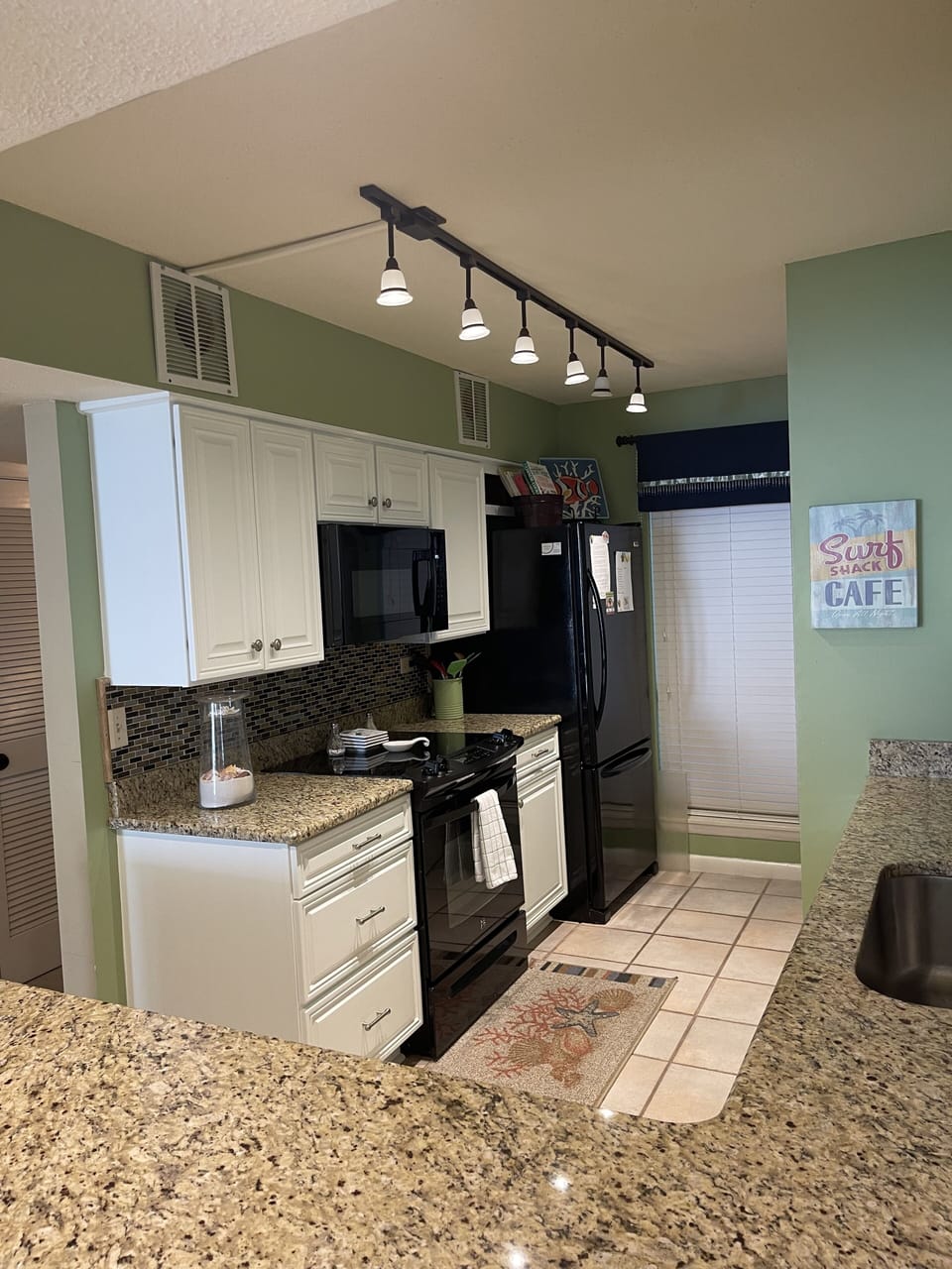 Kitchen. New dish washer, washer and dryer, microwave and refridgerator.