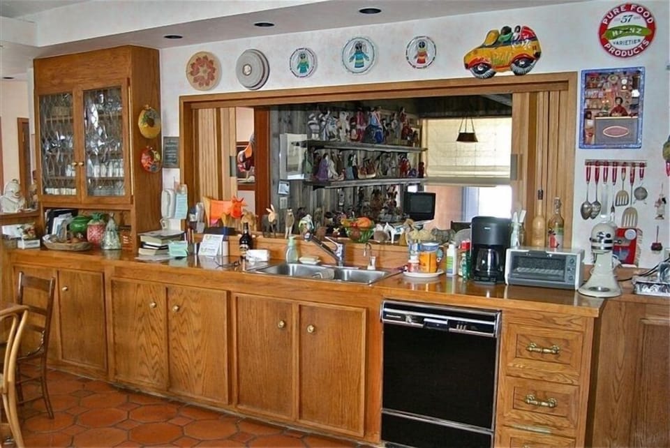 Fully stocked kitchen... with Wolf range, indoor gas barbeque grill