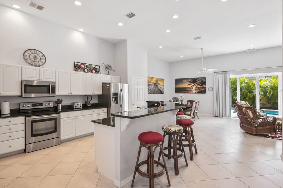 Open Concept Downstairs Kitchen, Dining, Lounge