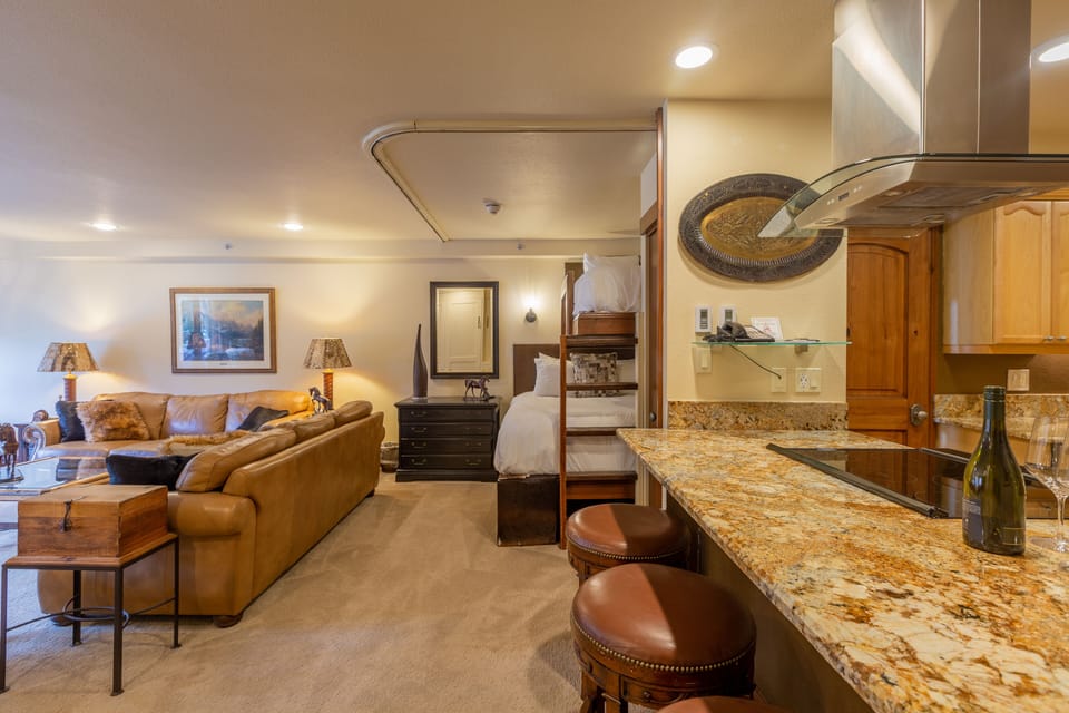 Bunkbed area tucked in the corner of the living room.