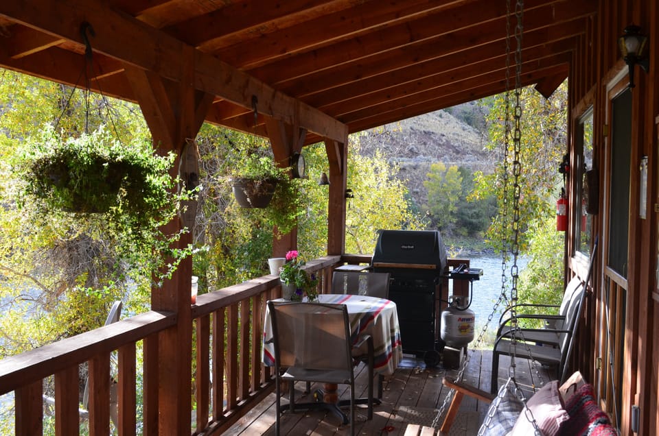 The cabin porch with river in the background...