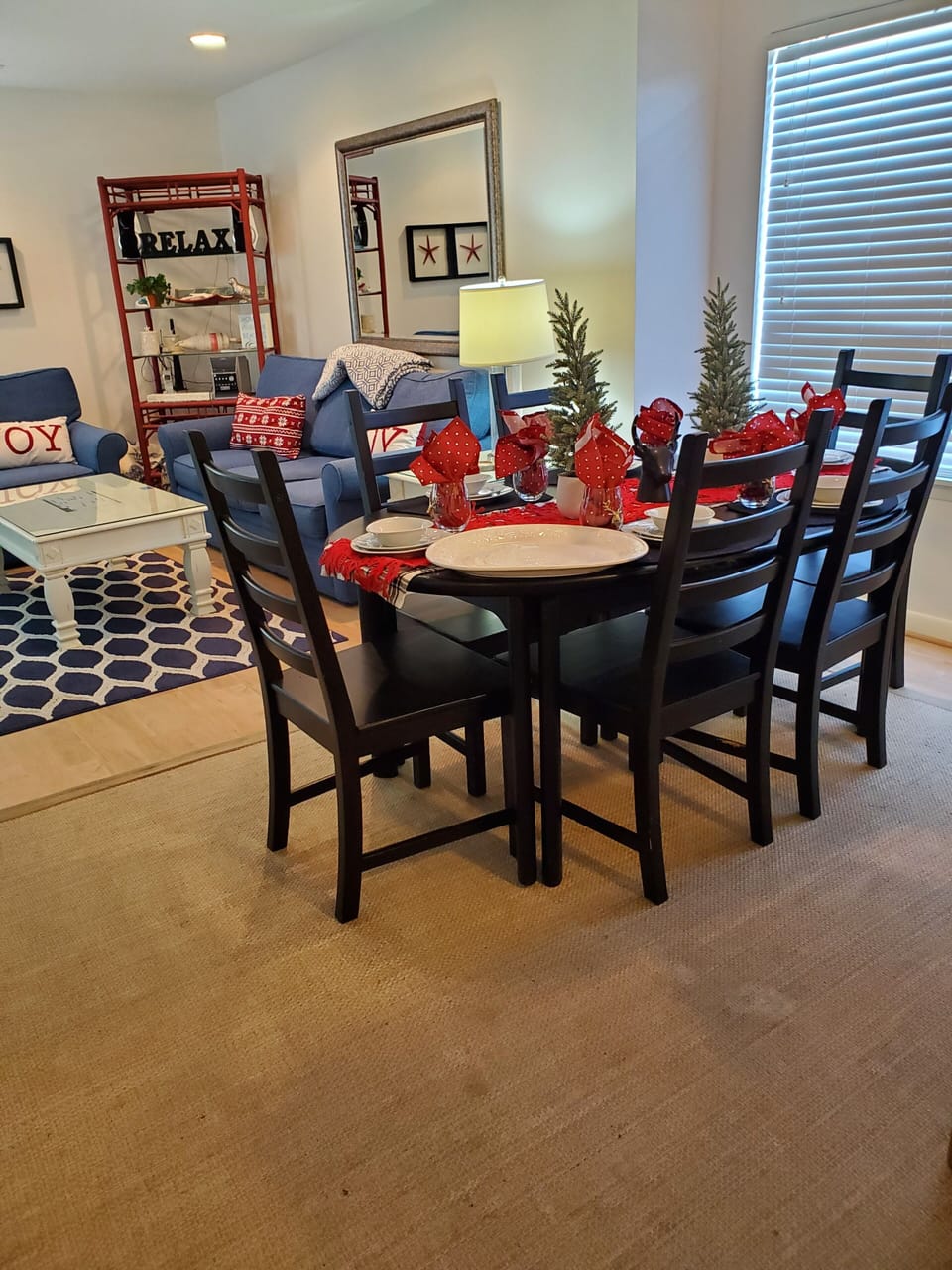 Large dining table with six chairs and expandable leaves.  Holiday Stay!