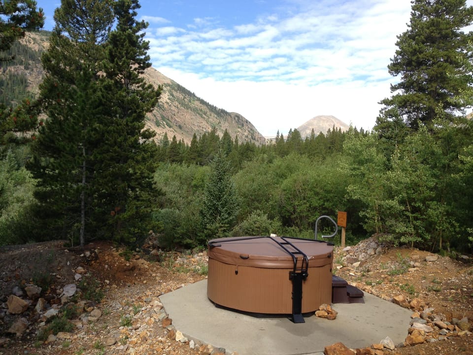 Secluded hot tub with views and sound of the river!