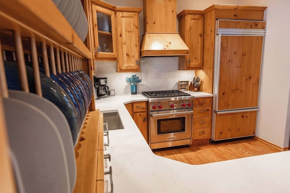 Significantly upgraded kitchen with Wolf stove + all the amenities and more. It's helpful to be married to a chef/caterer in ensuing our properties are equipped. 