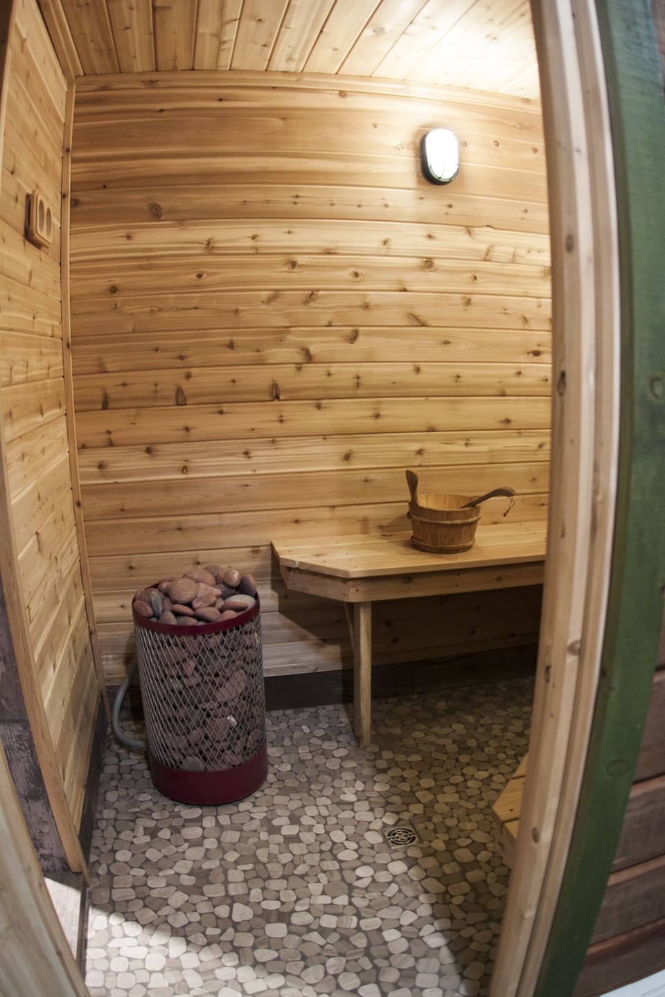 Sauna with tile walk in shower