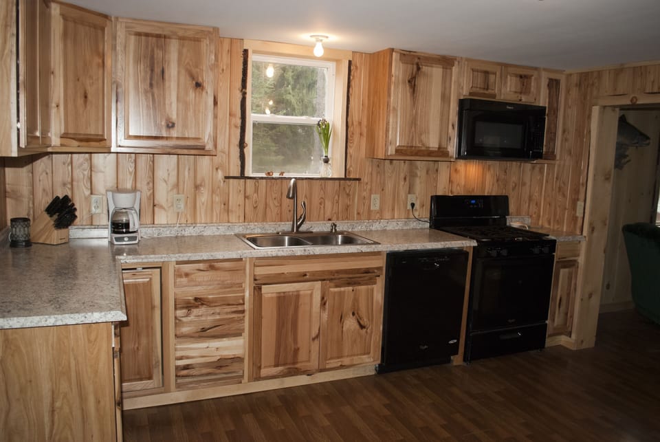 This modern kitchen has all the comforts of home!