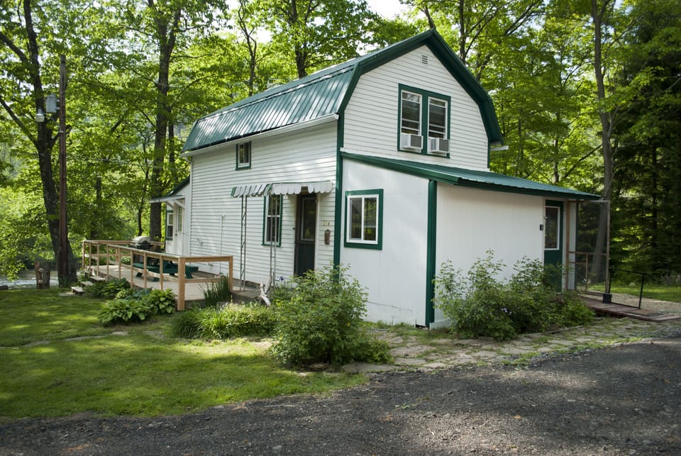 Generous parking behind the cabin
